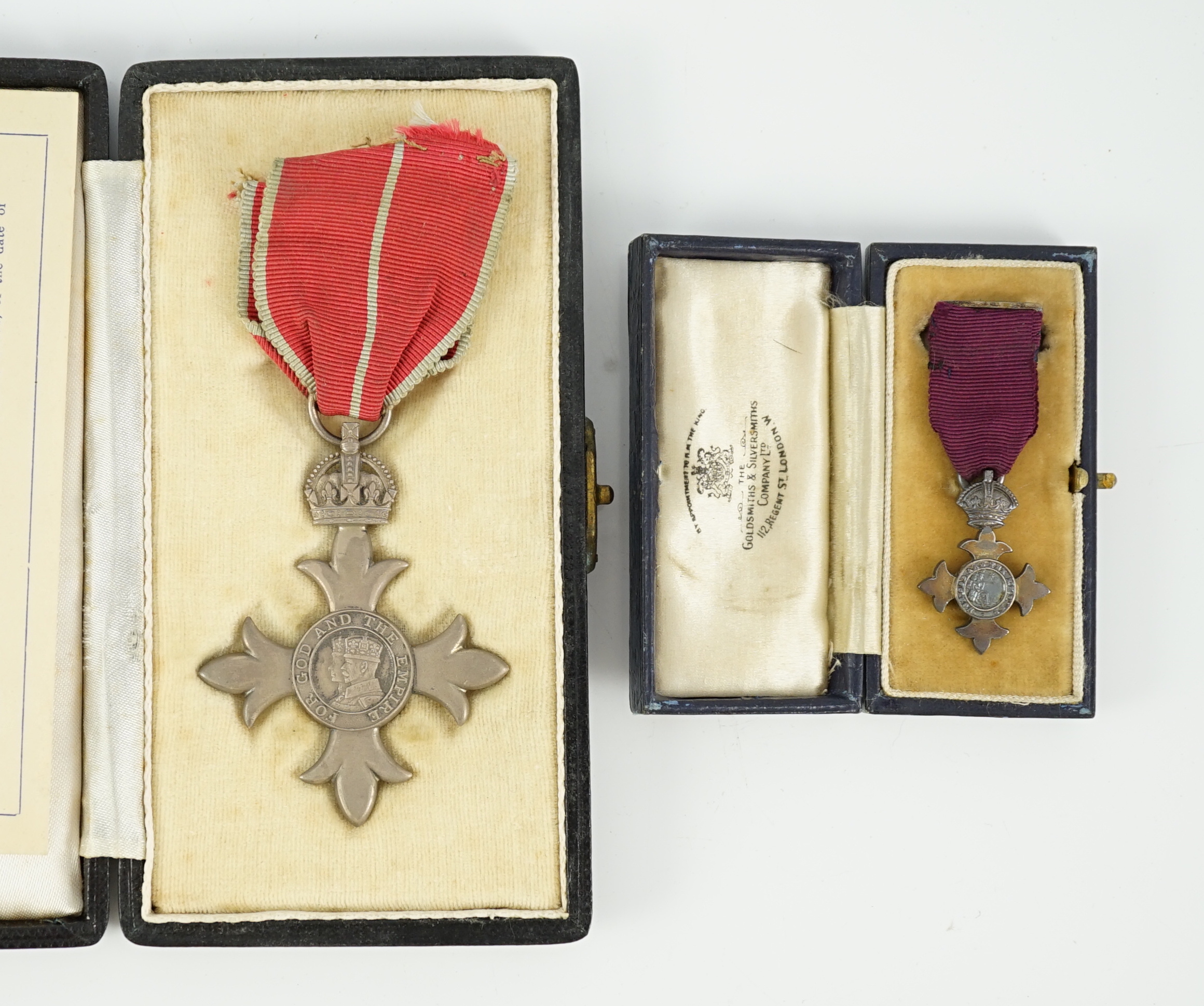 A cased George V military MBE containing leaflet with instructions as to wearing Insignia, together with the separately cased miniature